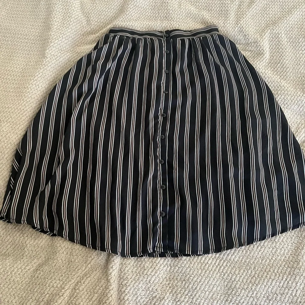 A-line black striped skirt